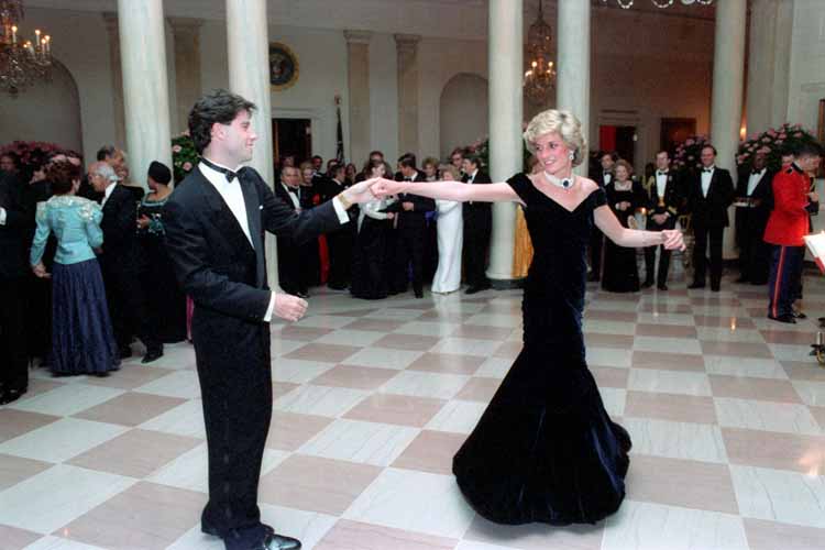 Princess Diana, aged 24, with John Travolta in 1985.