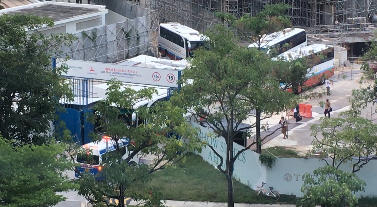 The construction site across from Doris' apartment. "Ambulances were seen outside its gates multiple times a day for a time and buses carted away people by the busload."