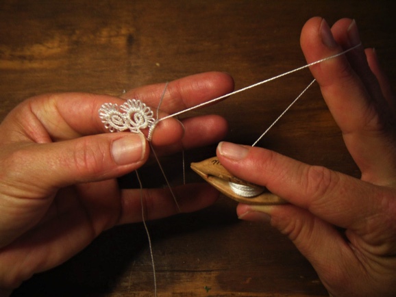 The process of lacemaking at Sabine's workshop.