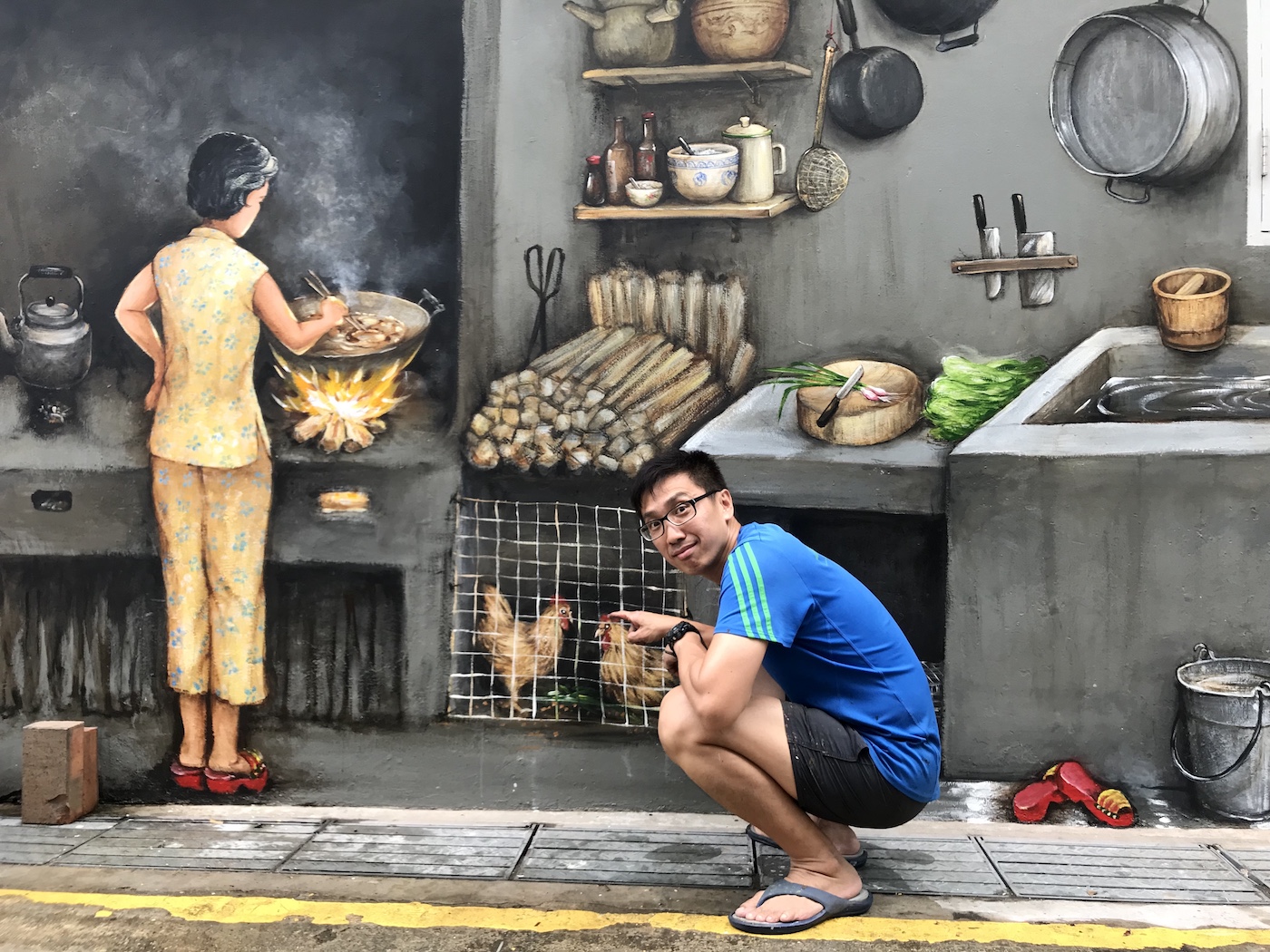 “My Chinatown Home” - Yew Chong and one of his favourite creations, painted on a wall located in Singapore’s Chinatown.